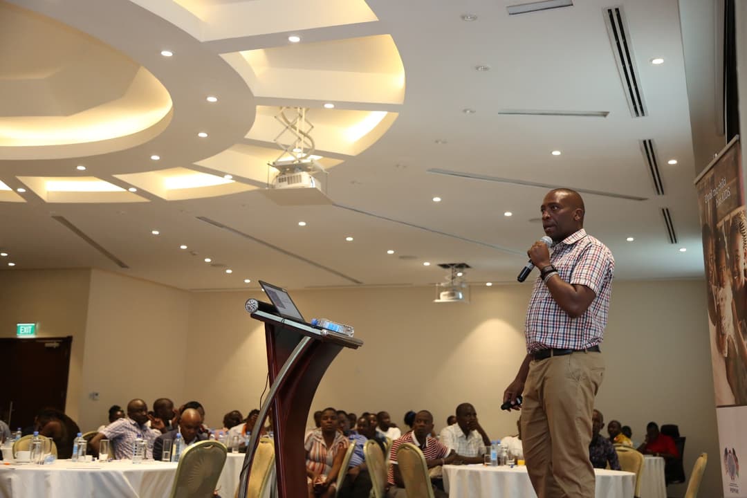 John Baru presenting at a global health conference